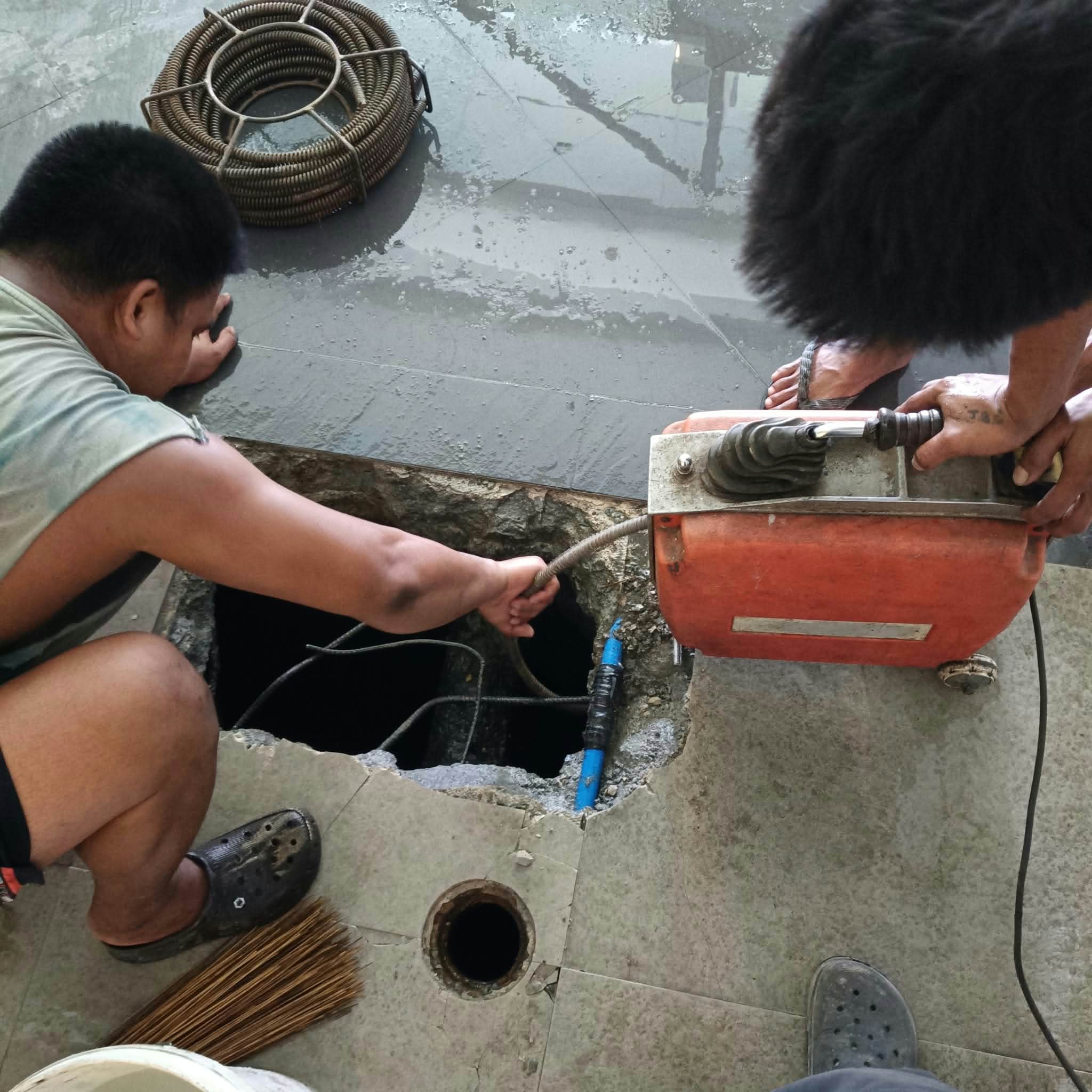 Drain-cleaning tools and equipment at a work site